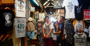 things to do in Bangkok : Chatuchak market clothes and travelers by Love Thai Maak